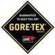 GORE-TEX®: Ultradünne und -leichte Membran aus gerecktem, mikroporösem PTFE (Polytetrafluorethylen). Sehr atmungsaktive und dauerhaft wasserdichte Membran.